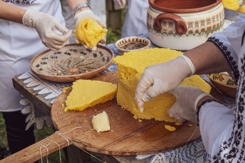 Authentic Italian recipes - Polenta being grated in Italy
