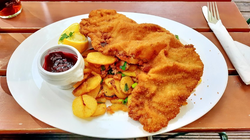 German schnitzel served with French fries at Après-ski 